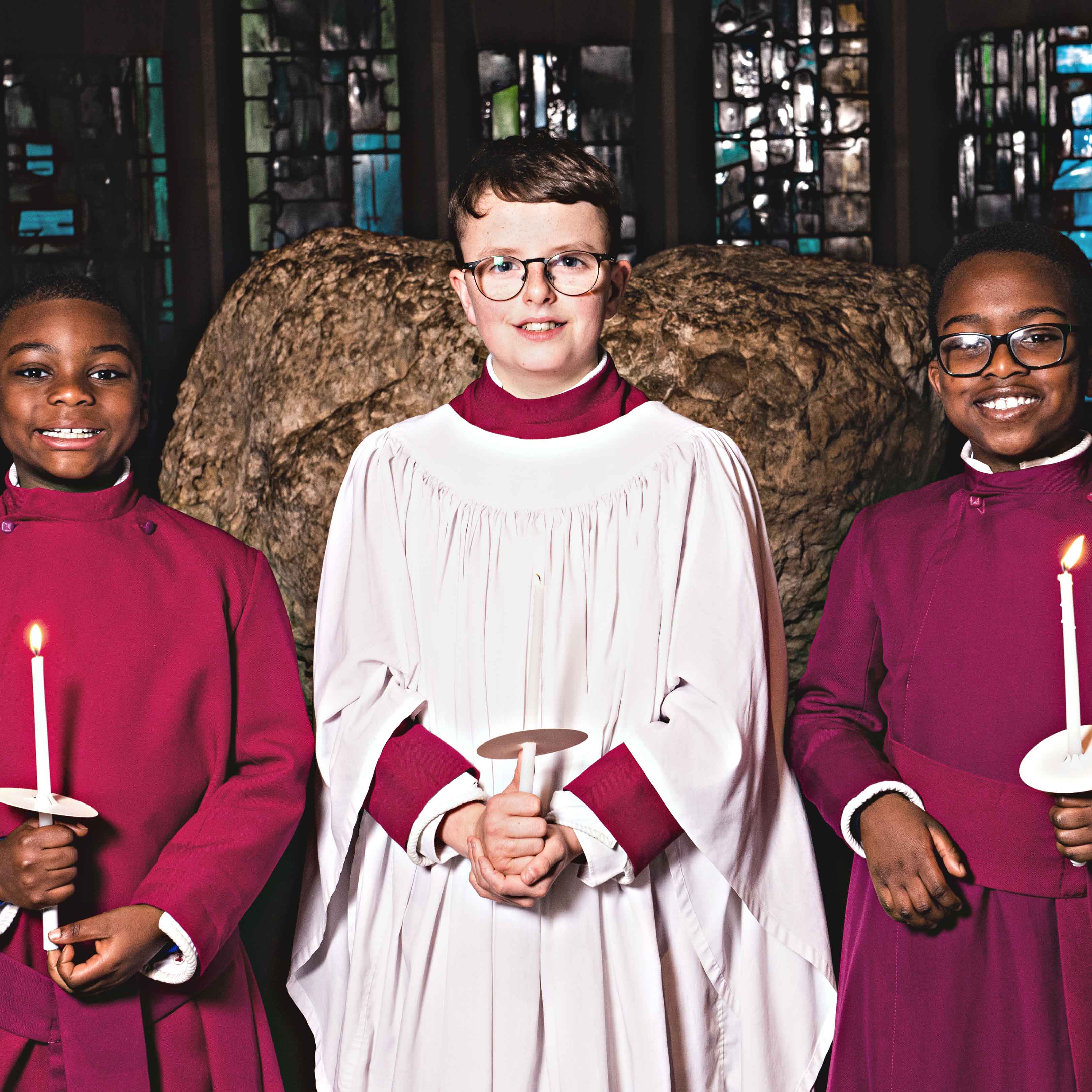 Choristers holding candles
