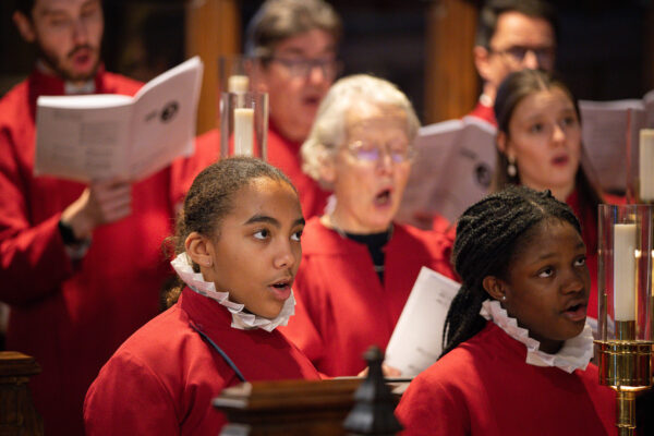 Members of Croydon Minster choir sing during a rehearsal