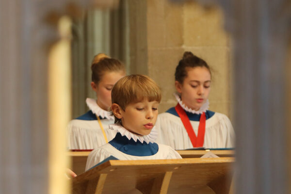 Choristers singing in Wells Cathedral