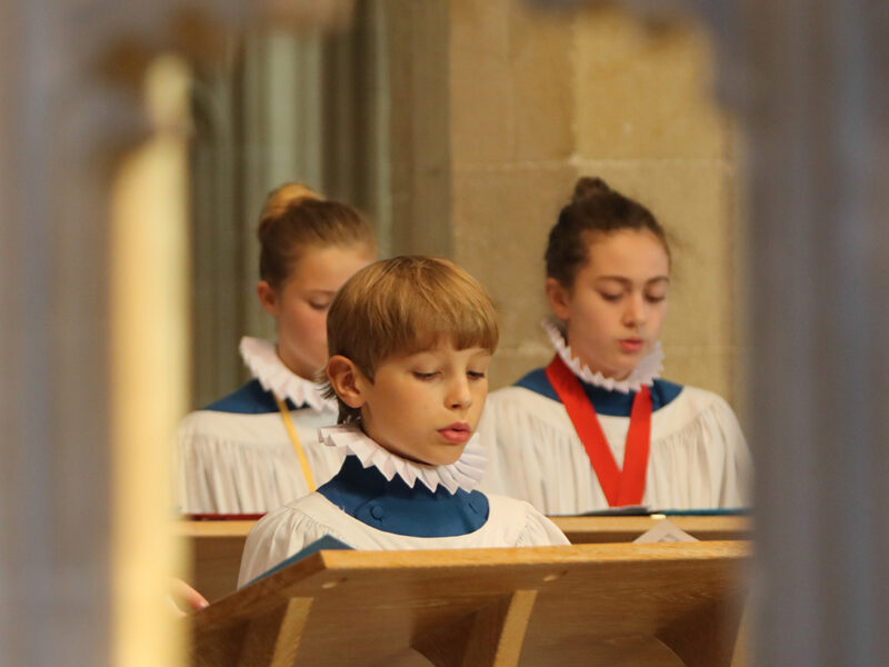 Choristers singing in Wells Cathedral