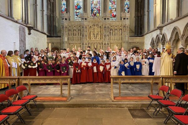 Massed choirs gathered after a join service in Brecon Cathedral
