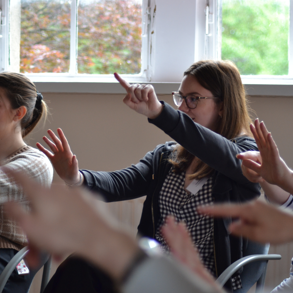 People take part in an interactive training session