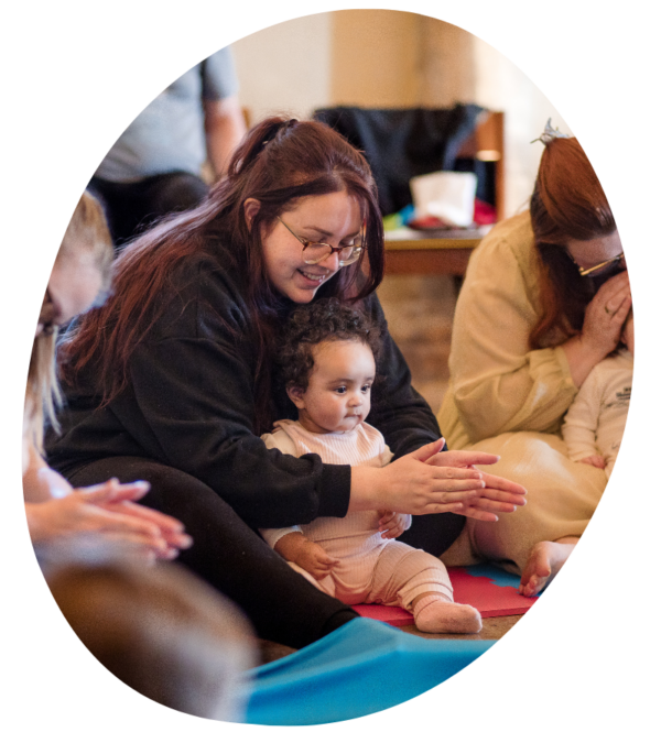 Parent and child at a music session
